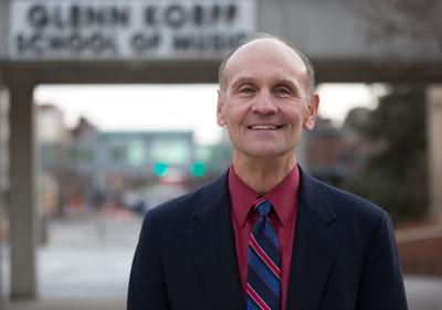 nierman nebraska education glenn dailynebraskan korff stands focus chair near