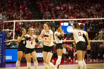 Nebraska volleyball survives slow start to squeak past Arkansas and