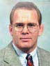 Neumann resigns as wrestling coach