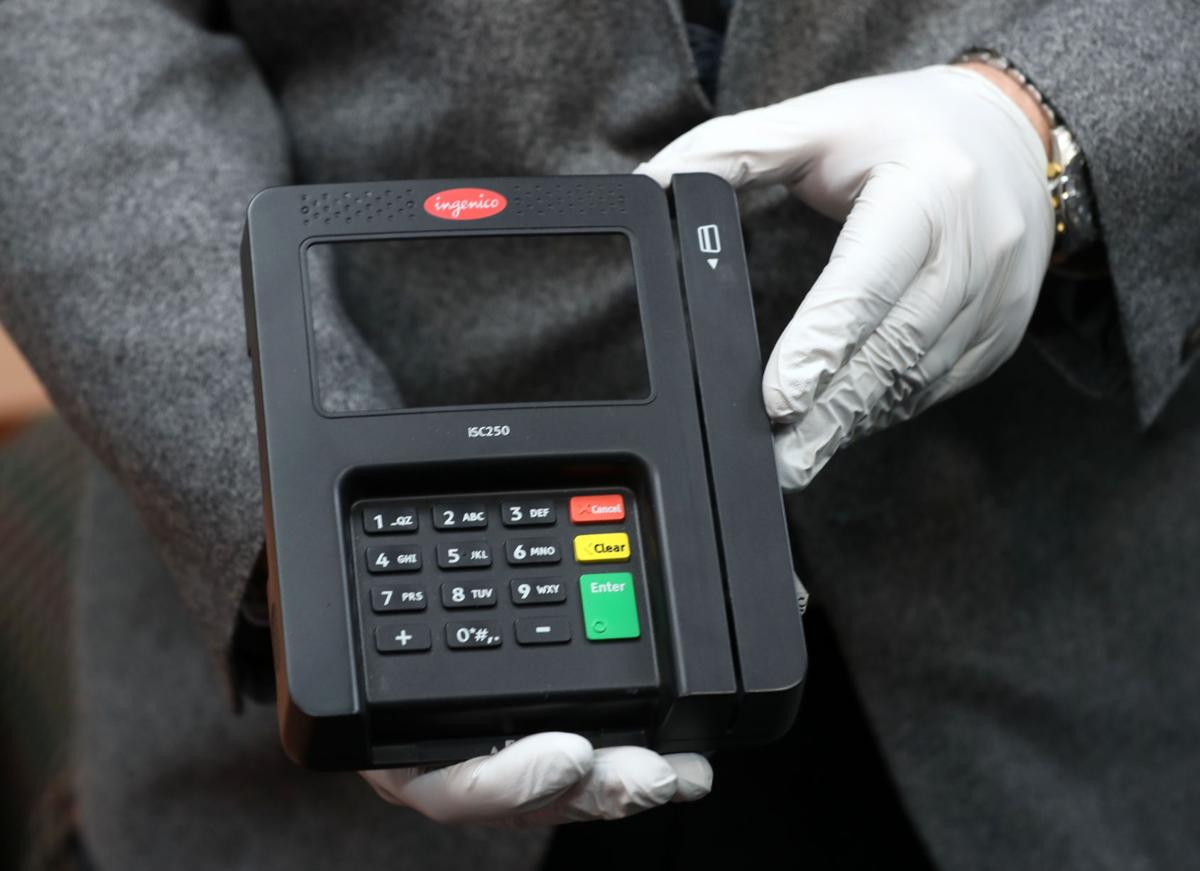 How to spot credit card skimmers hidden inside grocery stores, ATMs and gas  stations