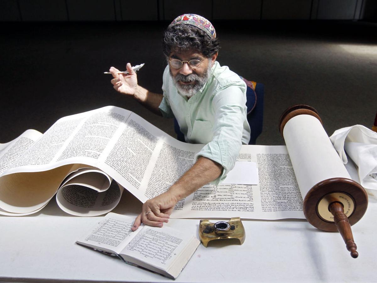 To restore Torah scrolls, scribe follows cherished traditions with To restore Torah scrolls, scribe follows cherished traditions with