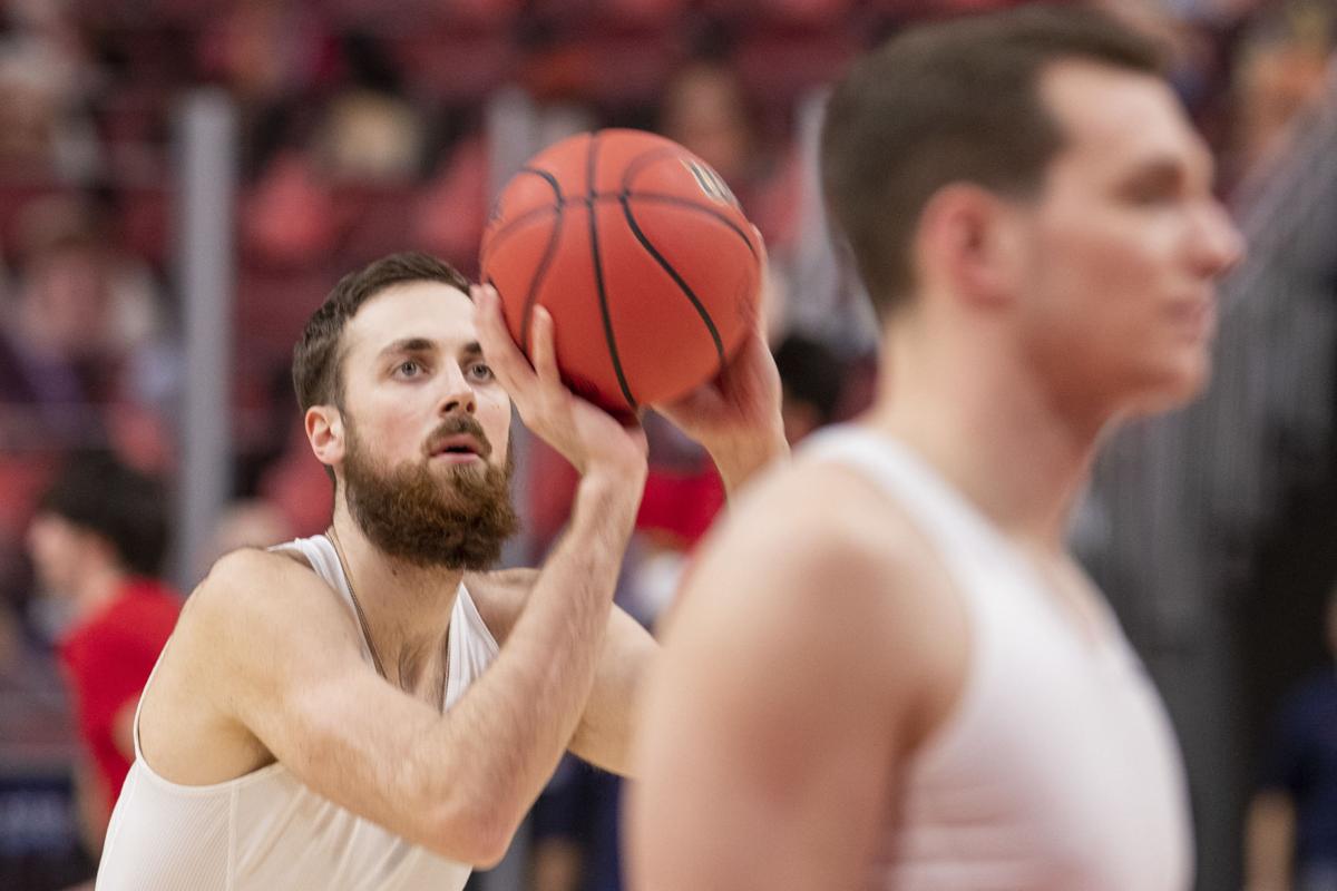 _t9i3262uofl_virginia_warmups