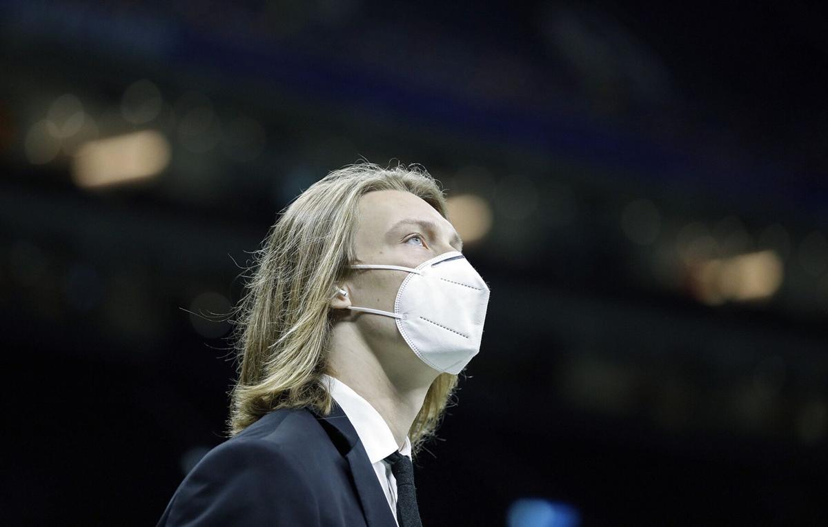 Clemson Tigers quarterback Trevor Lawrence walks around the field after entering the field before their game against Ohio State Buckeyes in the College Football Playoff semifinal at the Allstate Sugar Bowl in the Mercedes-Benz Superdome in New Orleans on Friday, Jan. 1, 2021.