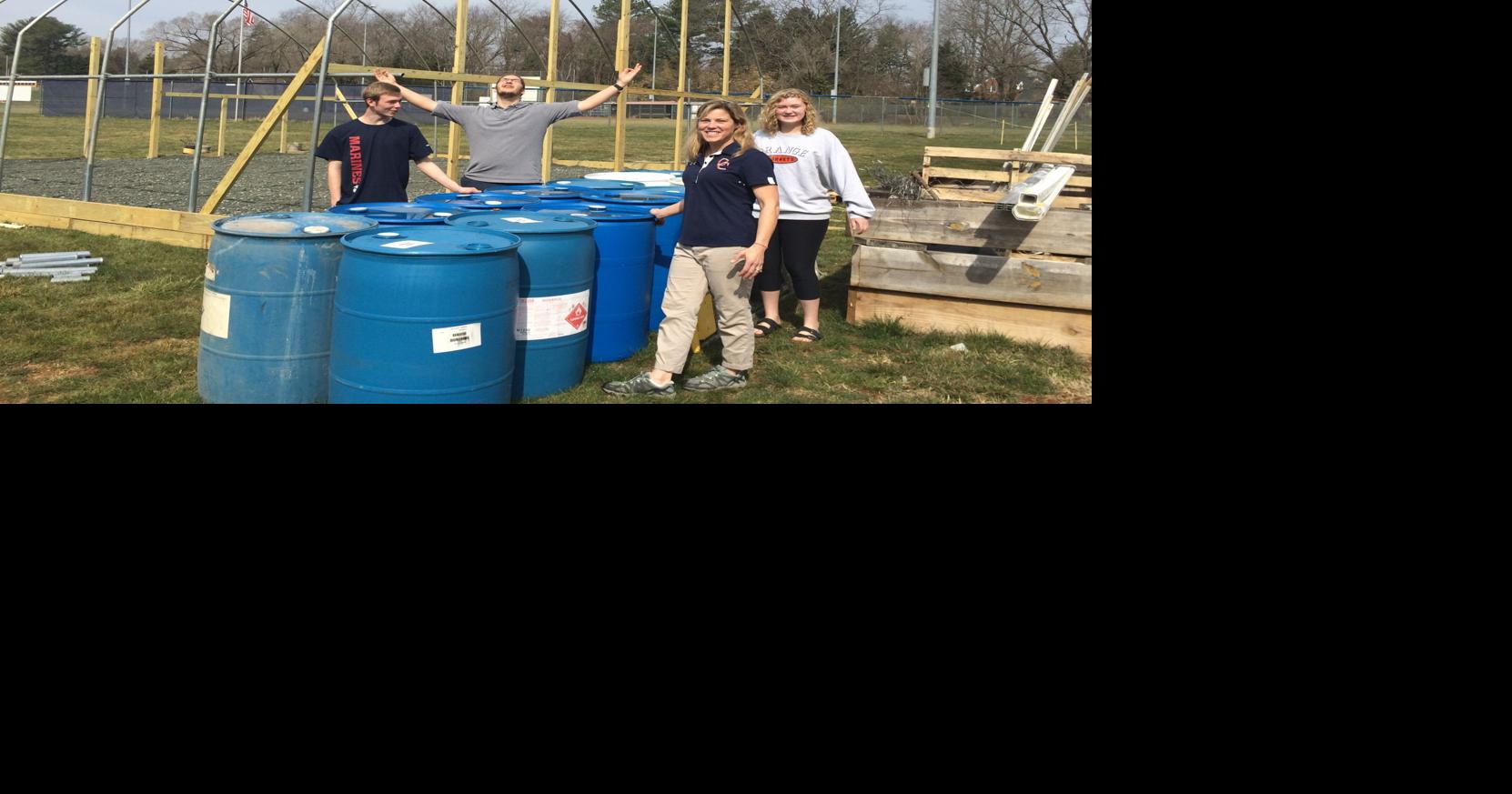 Growing and knowing OCHS science students, staff construct greenhouse