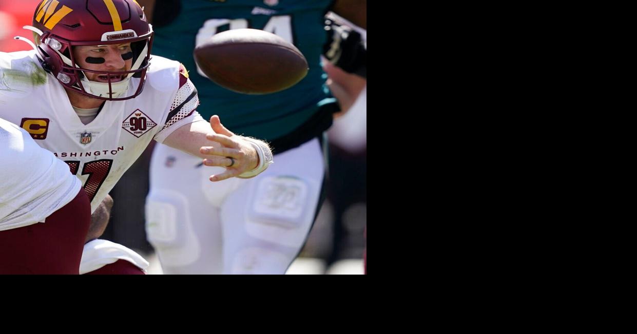 Commanders' Wentz fumbles, struggles in 1st game vs. Eagles