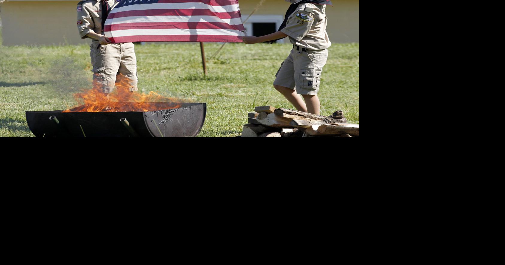 Boy Scouts give flags dignified end in retirement ceremony