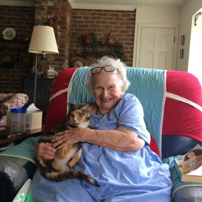 Joella Bradshaw and her cat, Pusser