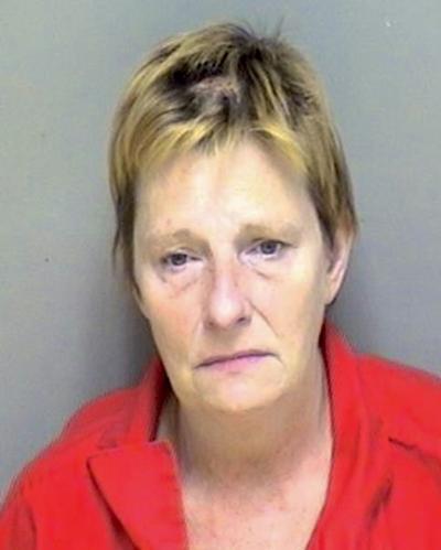 Woman charged with manslaughter after police find man stabbed in garage