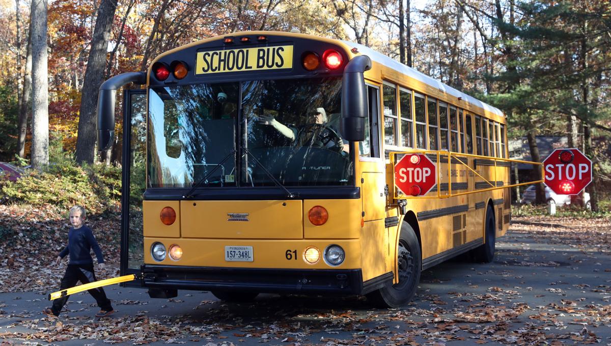Study Extended stop arms cut number of Albemarle school bus violations in half Local
