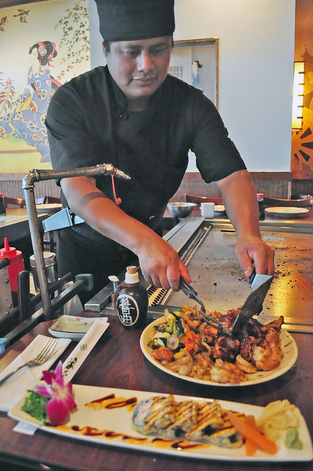 dinner-and-a-show-hibachi-chefs-cook-entertain