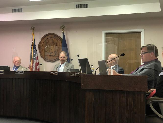 Orange County investigated by health department after unmasked supervisors  hold first meeting of pandemic era
