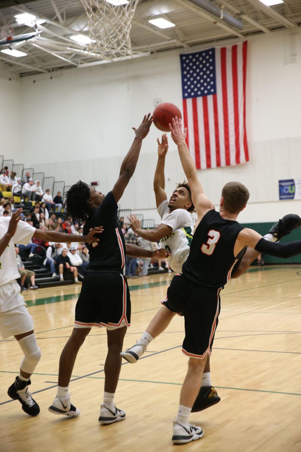 Charlottesville Boys Basketball Team Outlasts Louisa To Take