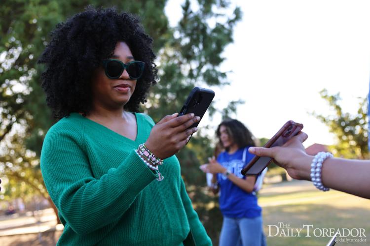 Students start early voting at March to the Polls event Gallery
