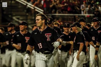 Easton Murrell and his teammates celebrate their 5-4 win against Texas