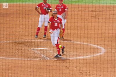 Olivia Rains gets to the game late in the first inning