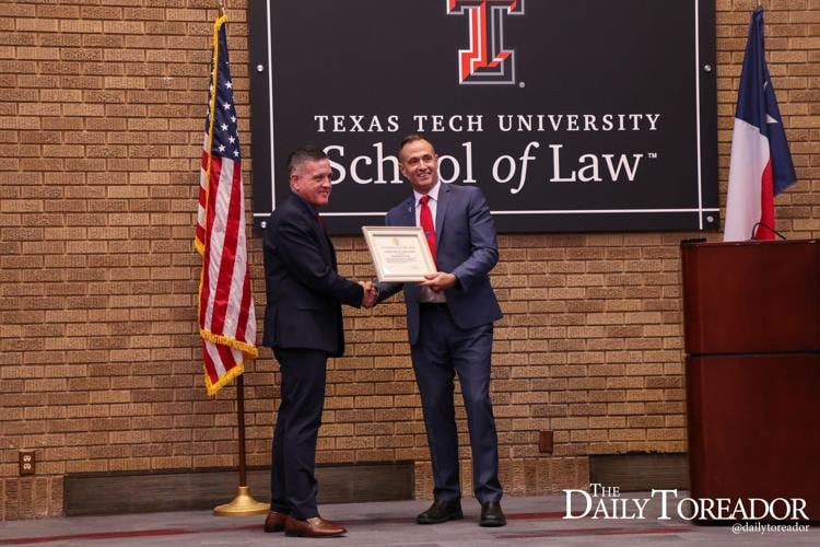 TTU Law Professor Geoffrey Corn receives certificate from U.S. Army