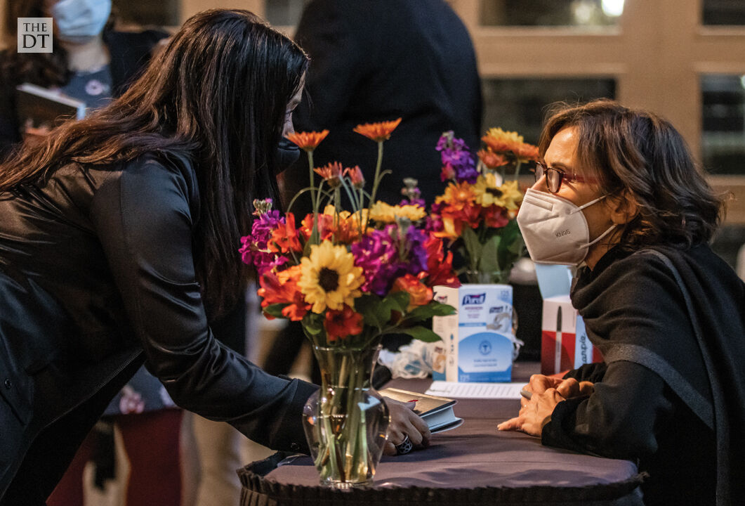 Vargas offers book signatures to event attendees
