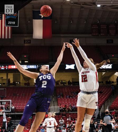 Vivian makes a shot at the end of the quarter