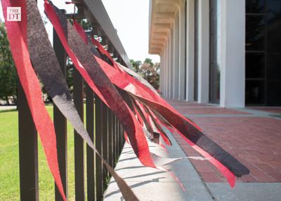 Red and balck streamers blow in wind