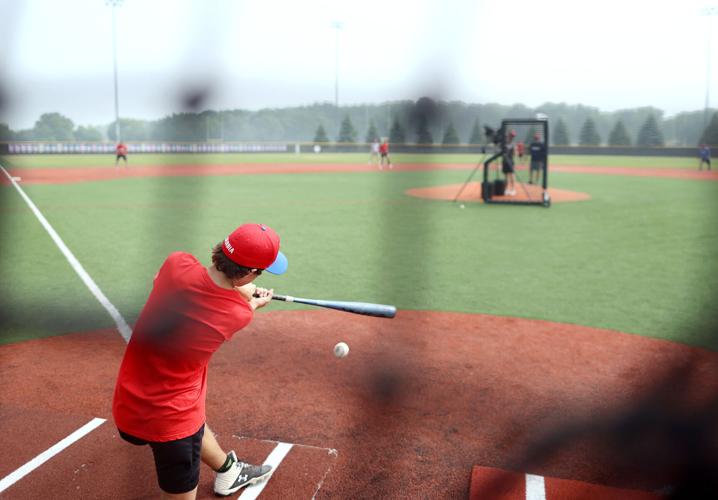 UWWhitewater baseball coach John Vodenlich hosts visiting Serbian