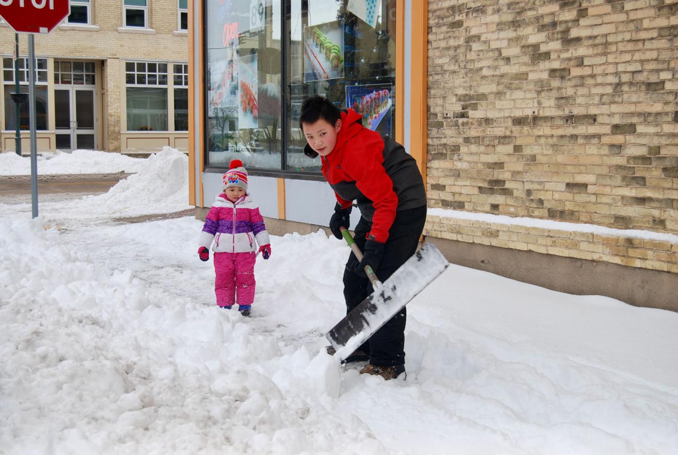 Shoveling with play breaks