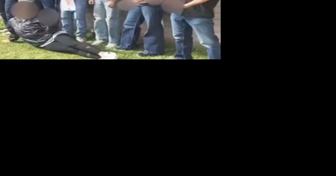 Students wear shirts spelling out n-word while standing behind mixed-race girl - Vimarsana News