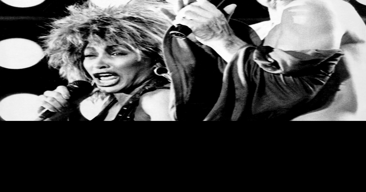 Tina Turner and Mick Jagger perform
