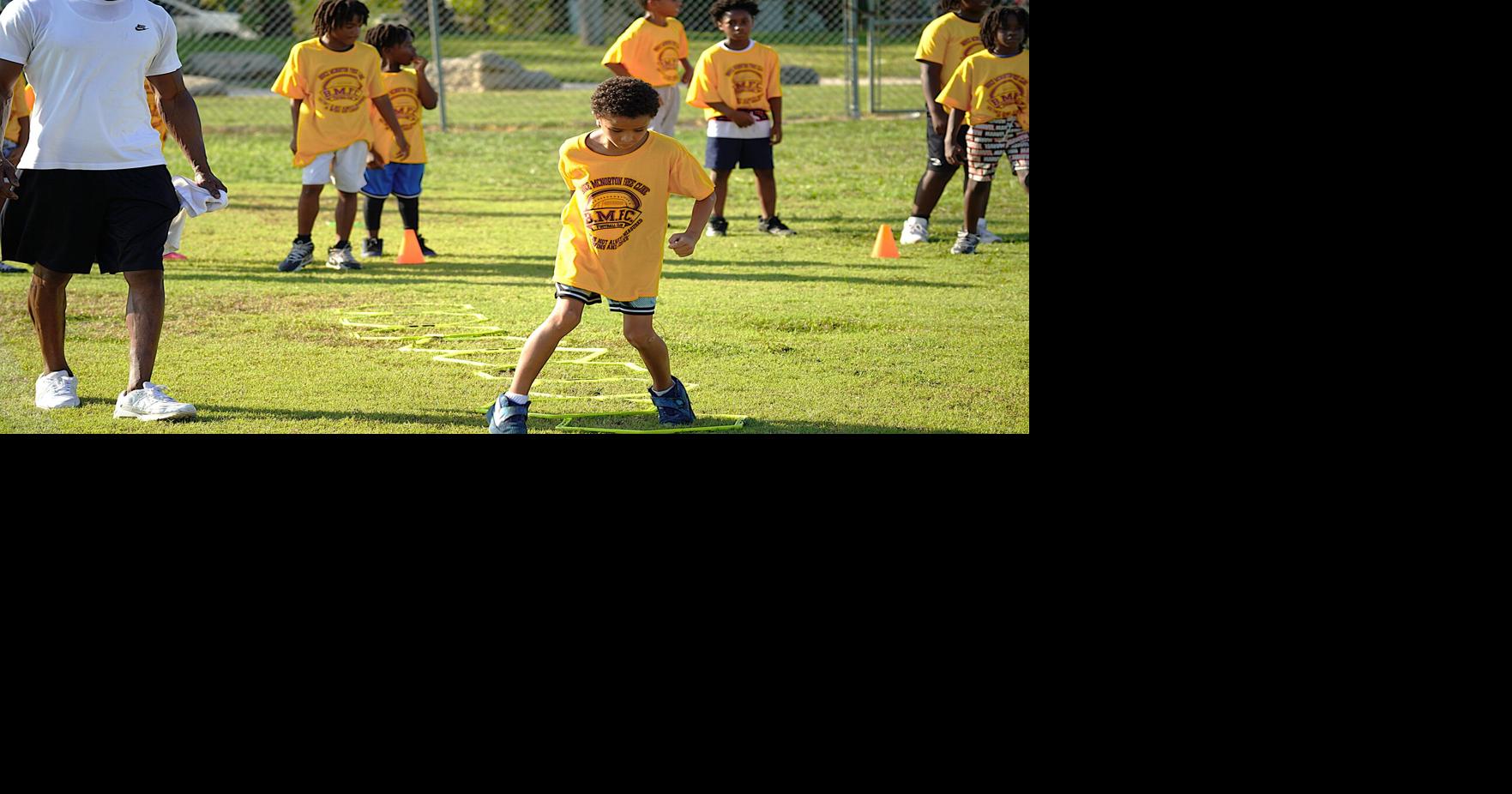 Youth learn from the pros at McNorton football camp