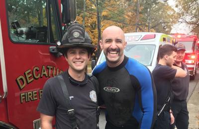Adam Kelly, left, and Josh Cardwell after water rescue