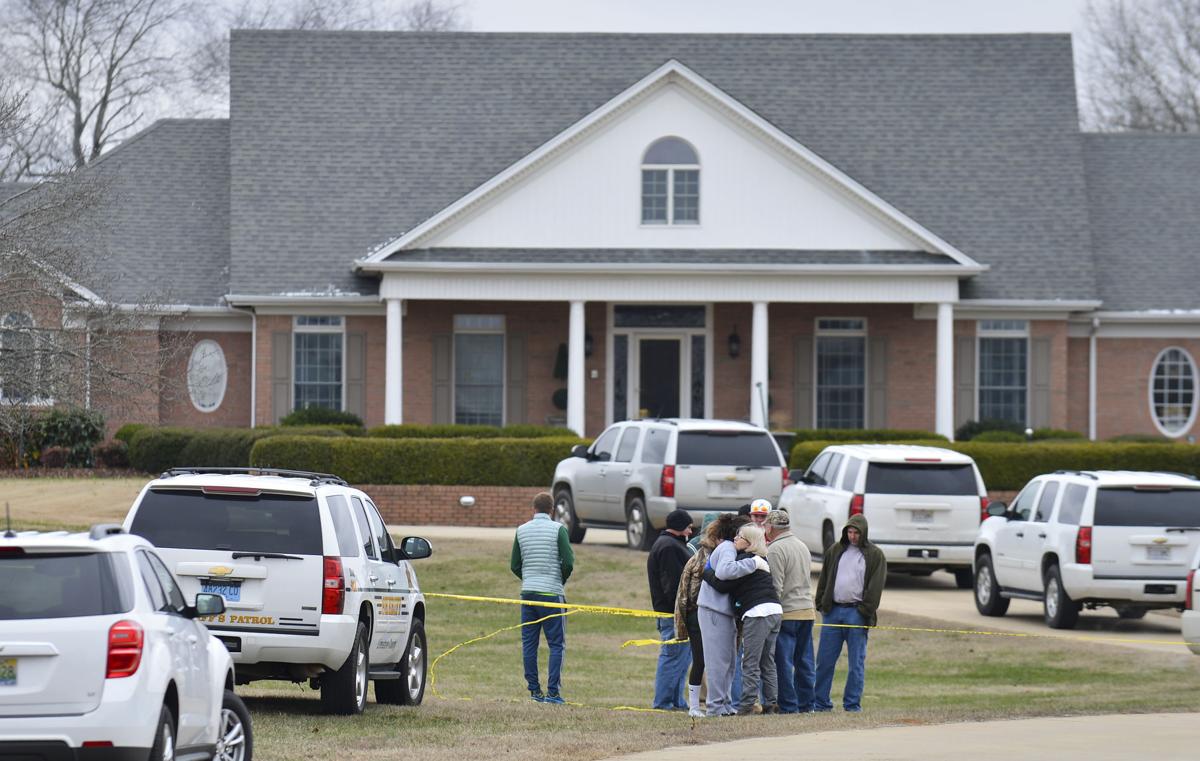 Officials Husband apparently fatally shot wife, himself in East