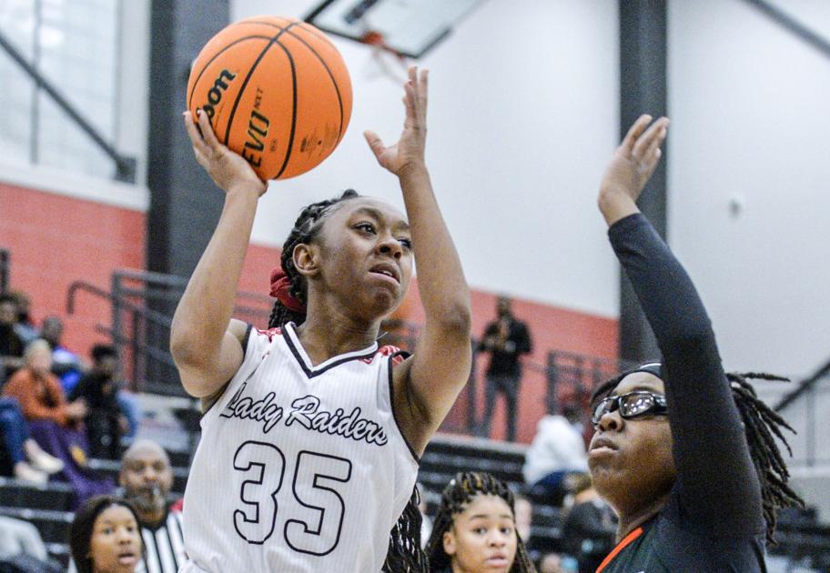 DecaturDaily.com - Austin girls prevail in first round image