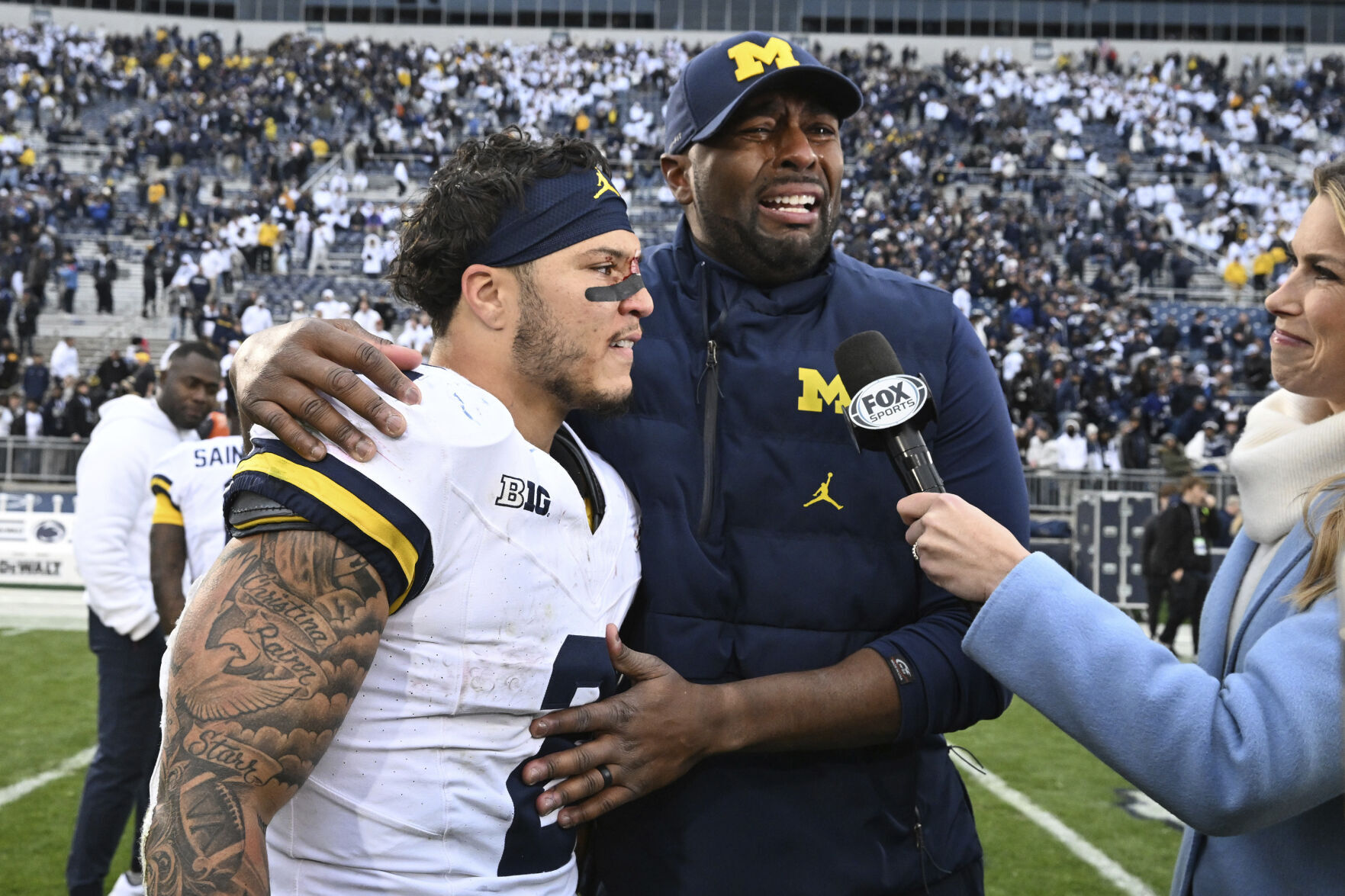 Interim Michigan coach known for passion College Headlines