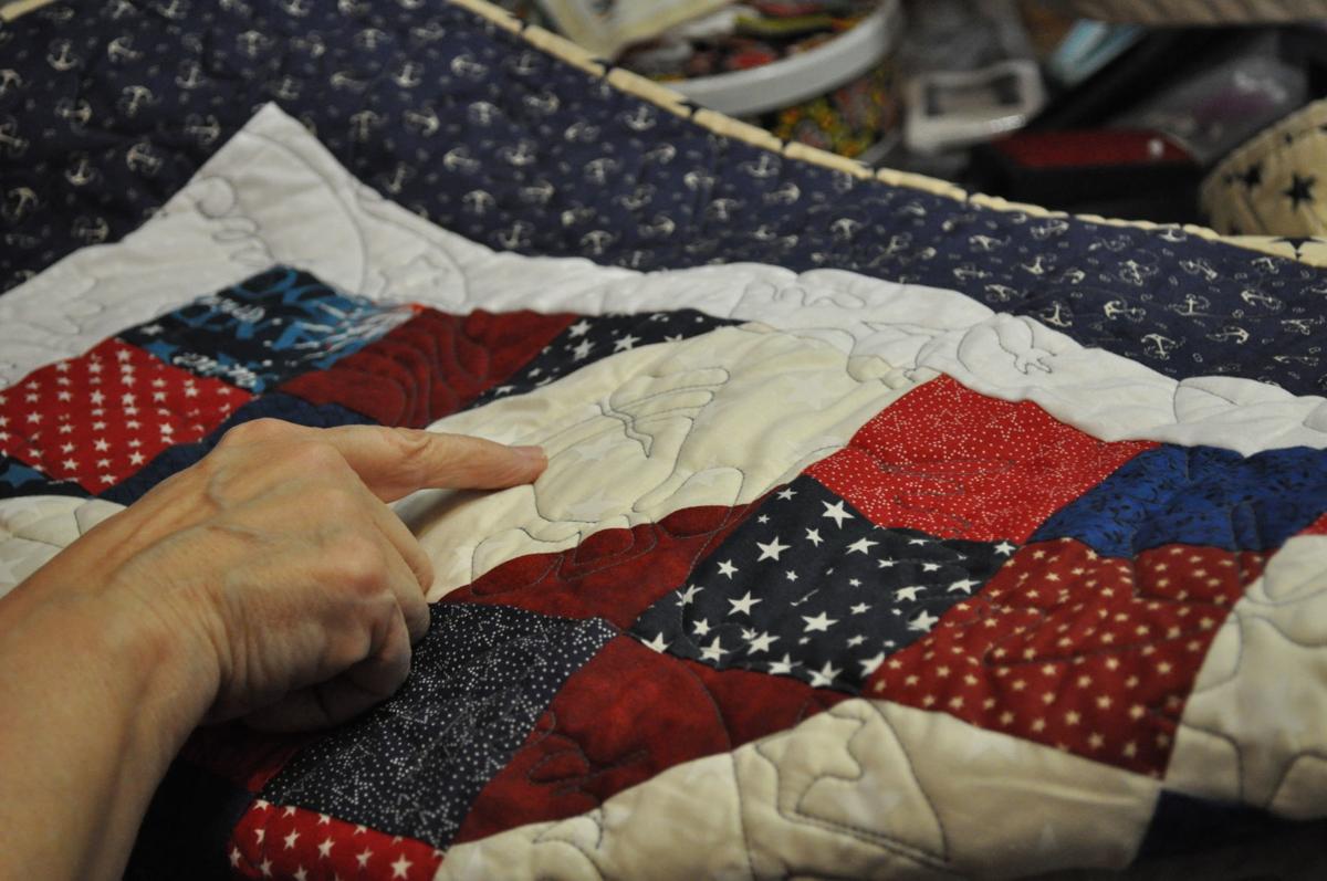 Quilts of Valor Volunteers honor veterans with quilts offering comfort