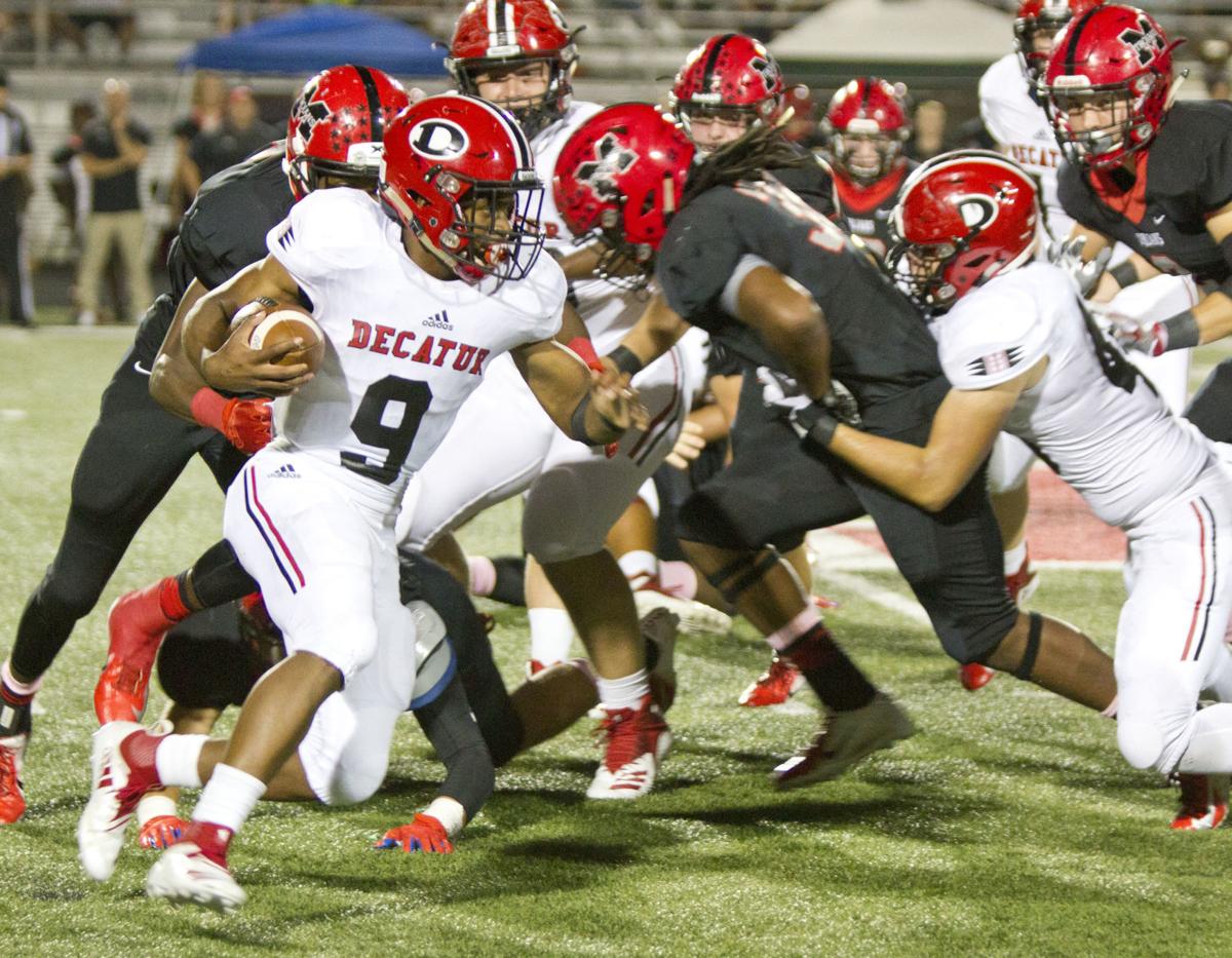 MUSCLE SHOALS 41, DECATUR 28 Red Raiders fall to the Trojans in region