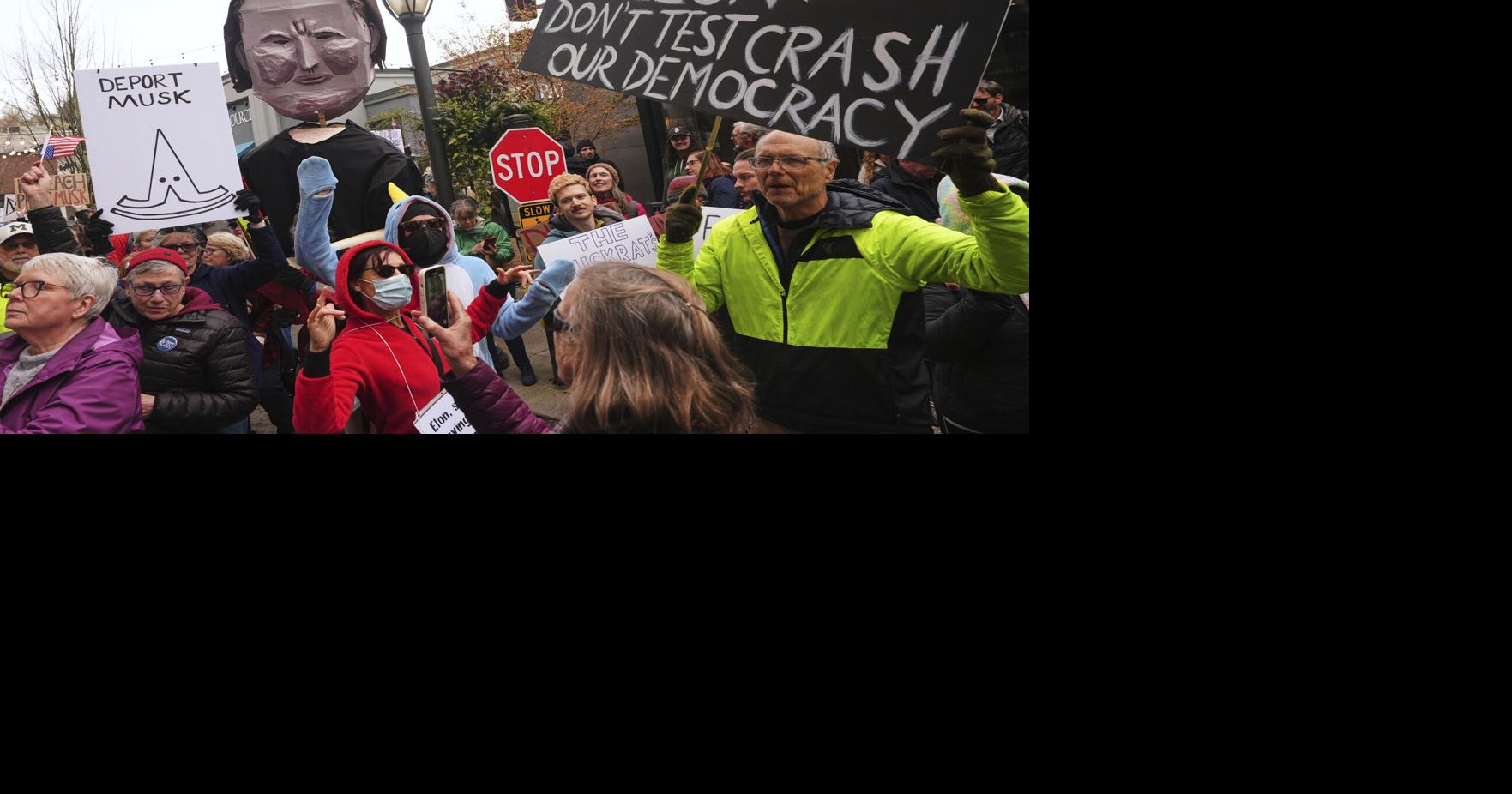 Protests against Elon Musk's purge of US government swarm Tesla