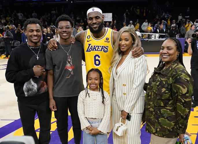 LeBron James of the Los Angeles Lakers hugs Bad Bunny after