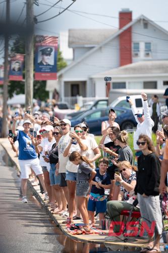 Crowds take photos during the pony parade