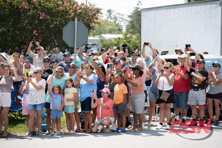 Crowds take photos during the pony parade
