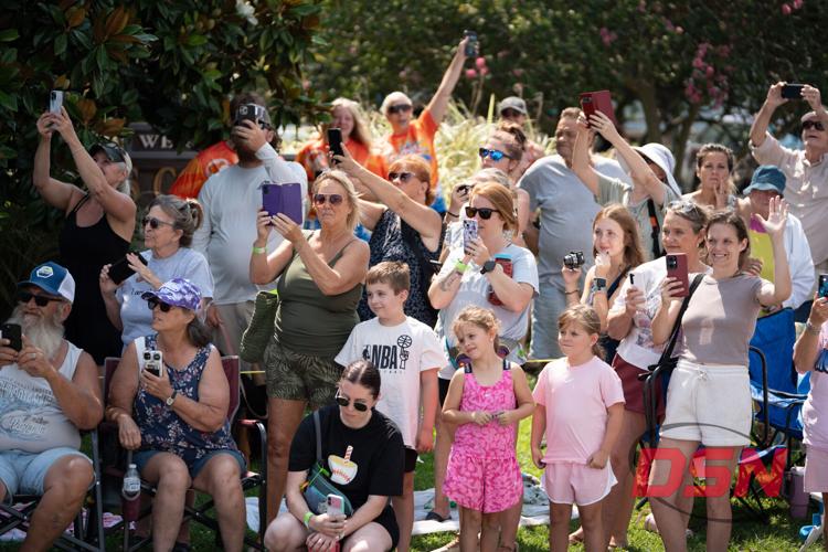 Crowds take photos during the pony parade