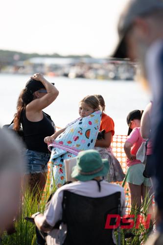 Girl wrapped in a towel by the water.jpg