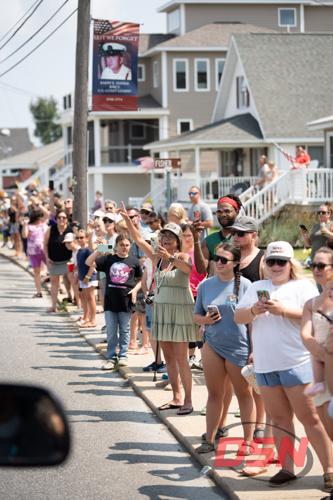 Crowds take photos during the pony parade