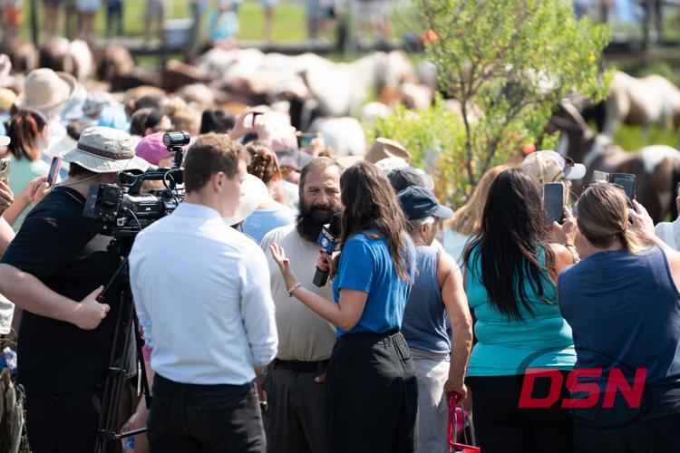 WBOC reporter Grace Harman interviewing attendees
