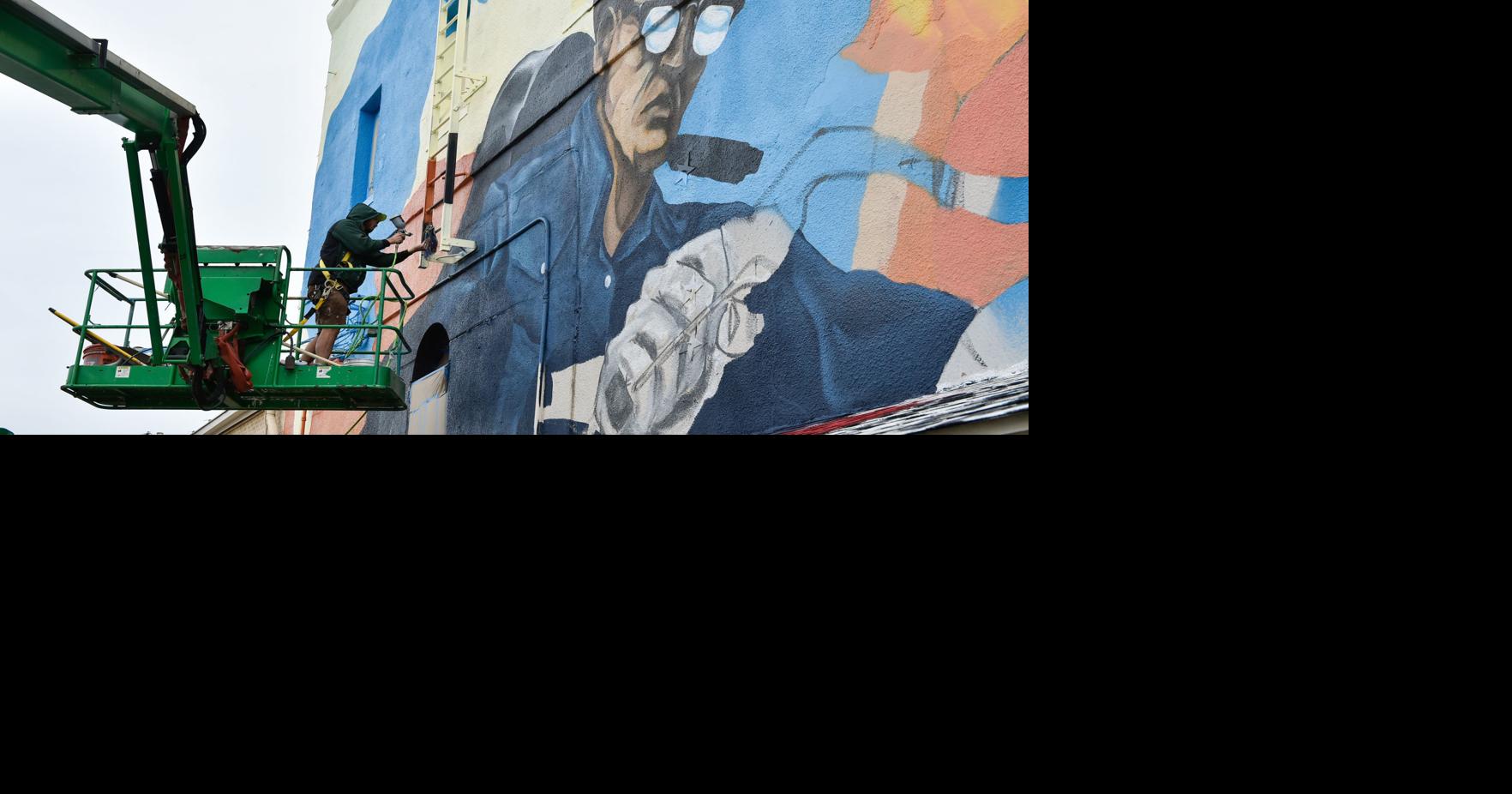 ‘Something bigger than me’: Muralist's art speaks to the public ...