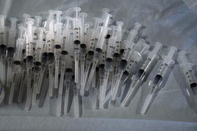 Vaccine syringes