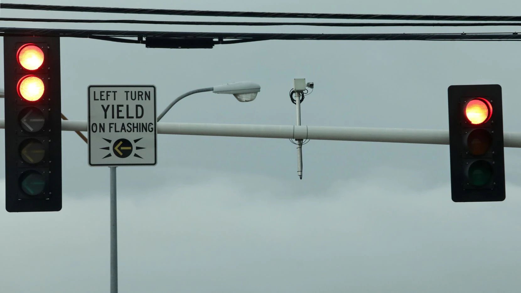 black camera on street light