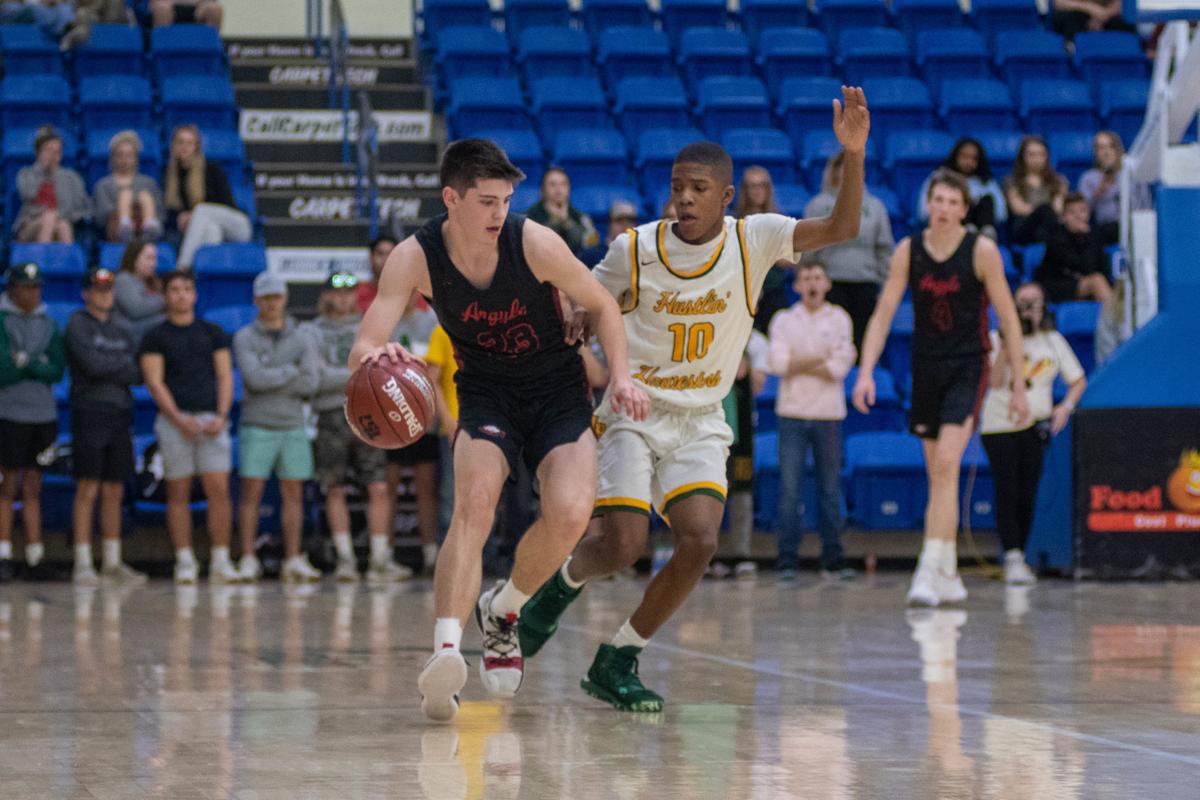 Boys basketball Argyle defeats Pampa and advances to the state