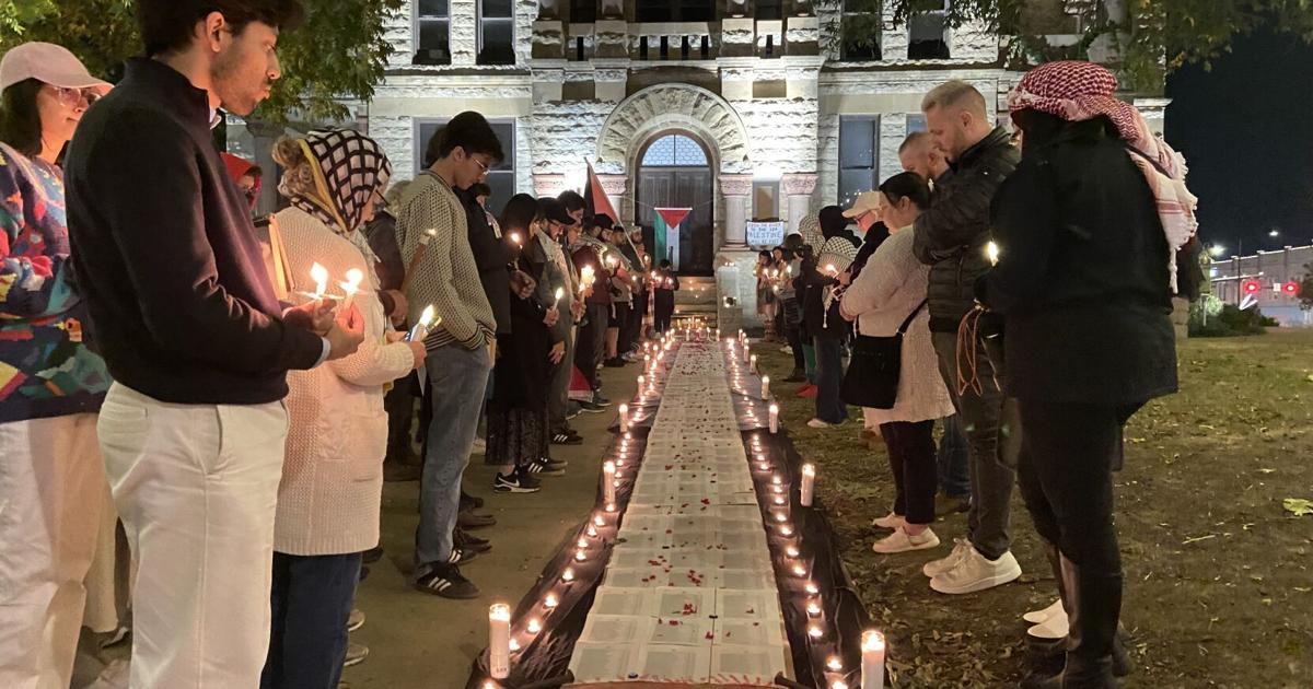 Dozens attend pro-Palestine candlelight vigil and rally held on the Square