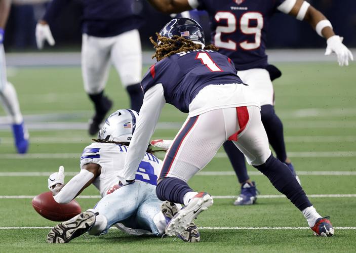 Photos: Cowboys avoid being upset at home, come back to win over Texans