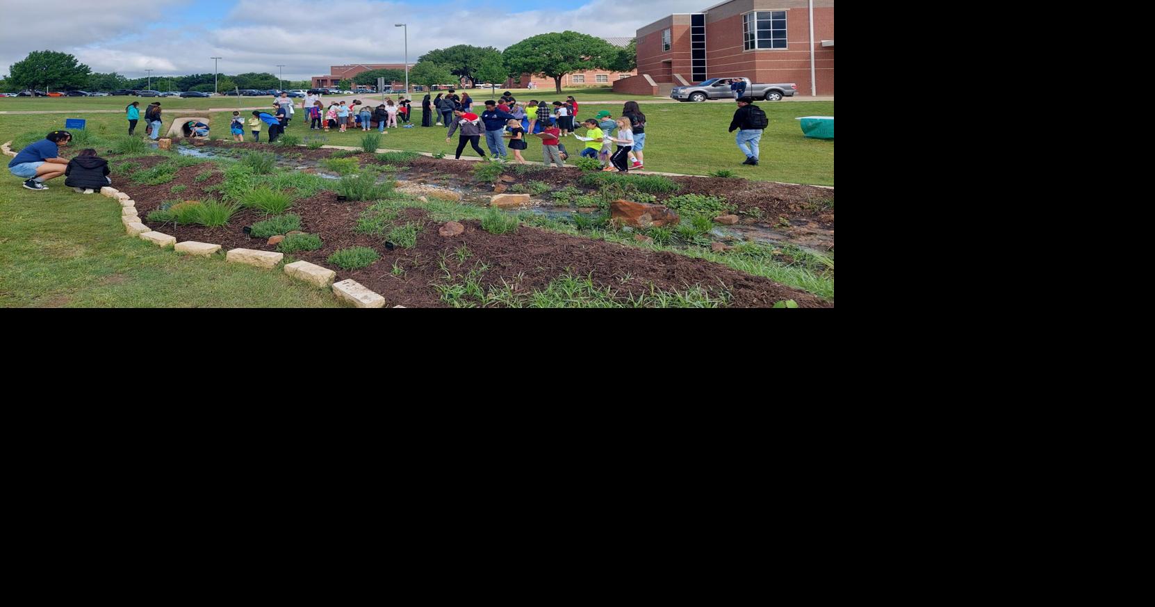 Look: Master Naturalists, students & teachers unveil Ryan High rain ...