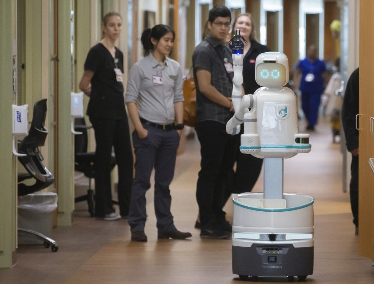 Medical delivery robot Moxi being tested at Texas hospital Ap